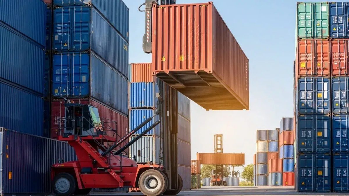Forklift lifting a shipping container